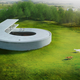 Illustration for article titled This Massive Concrete Loop Is Part House, Part Car Gallery
